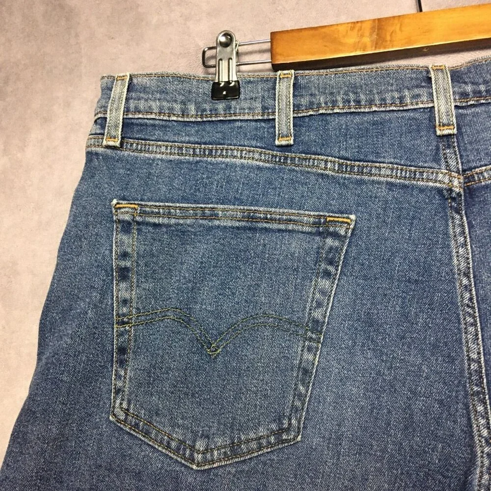 Levis Mens 505 Regular Fit Blue Jeans size 42x32 Stretch Denim Pants Cool Fading
